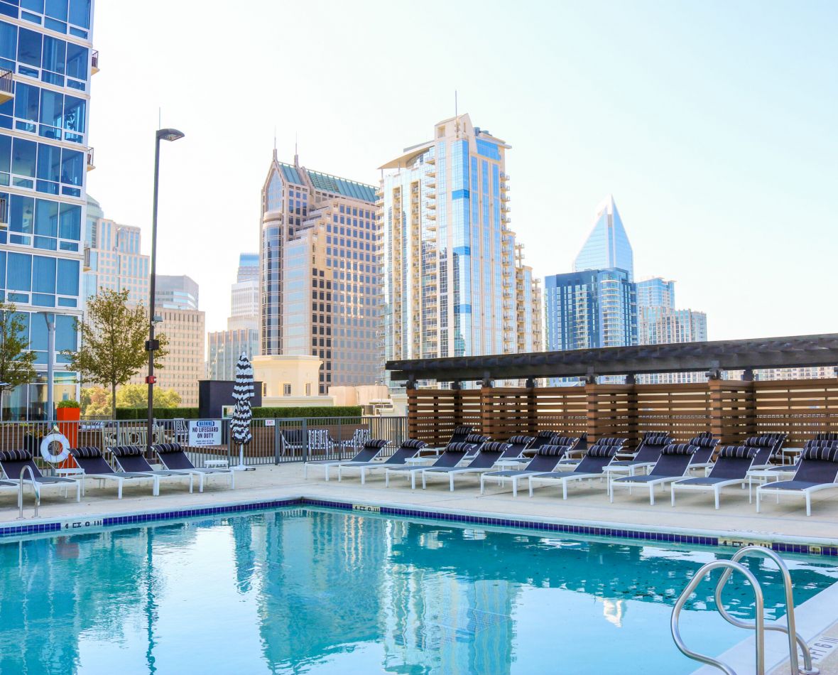 The Vue Charlotte rooftop luxury pool with surrounding outdoor lounge area