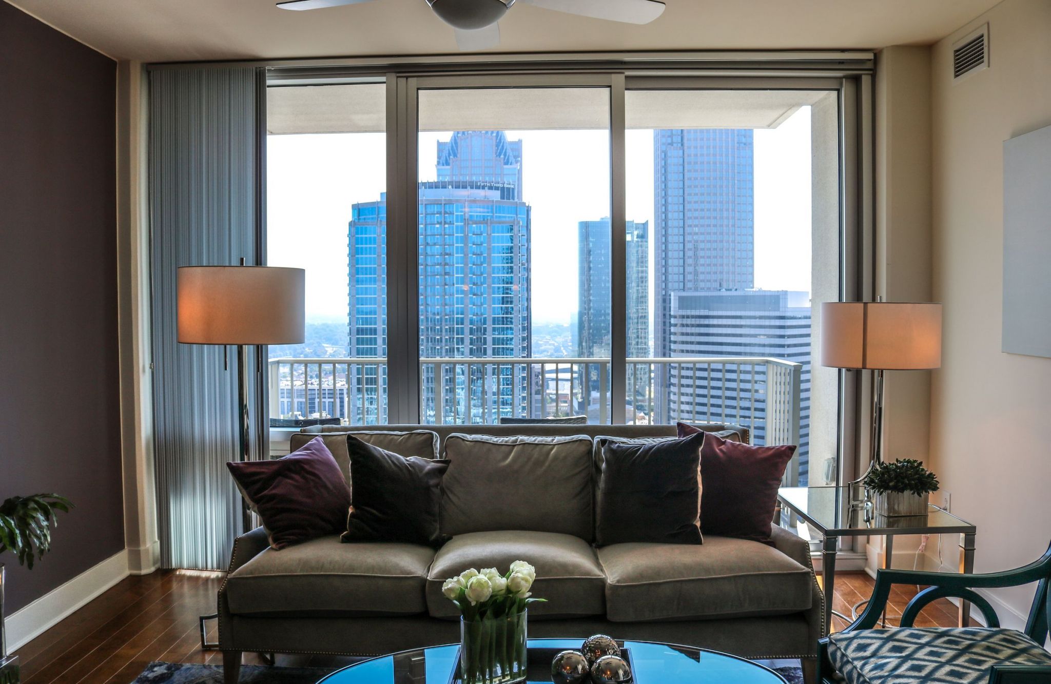 The Vue at Charlotte, NC spacious apartment bathroom with glass-enclosed shower and rain showerhead