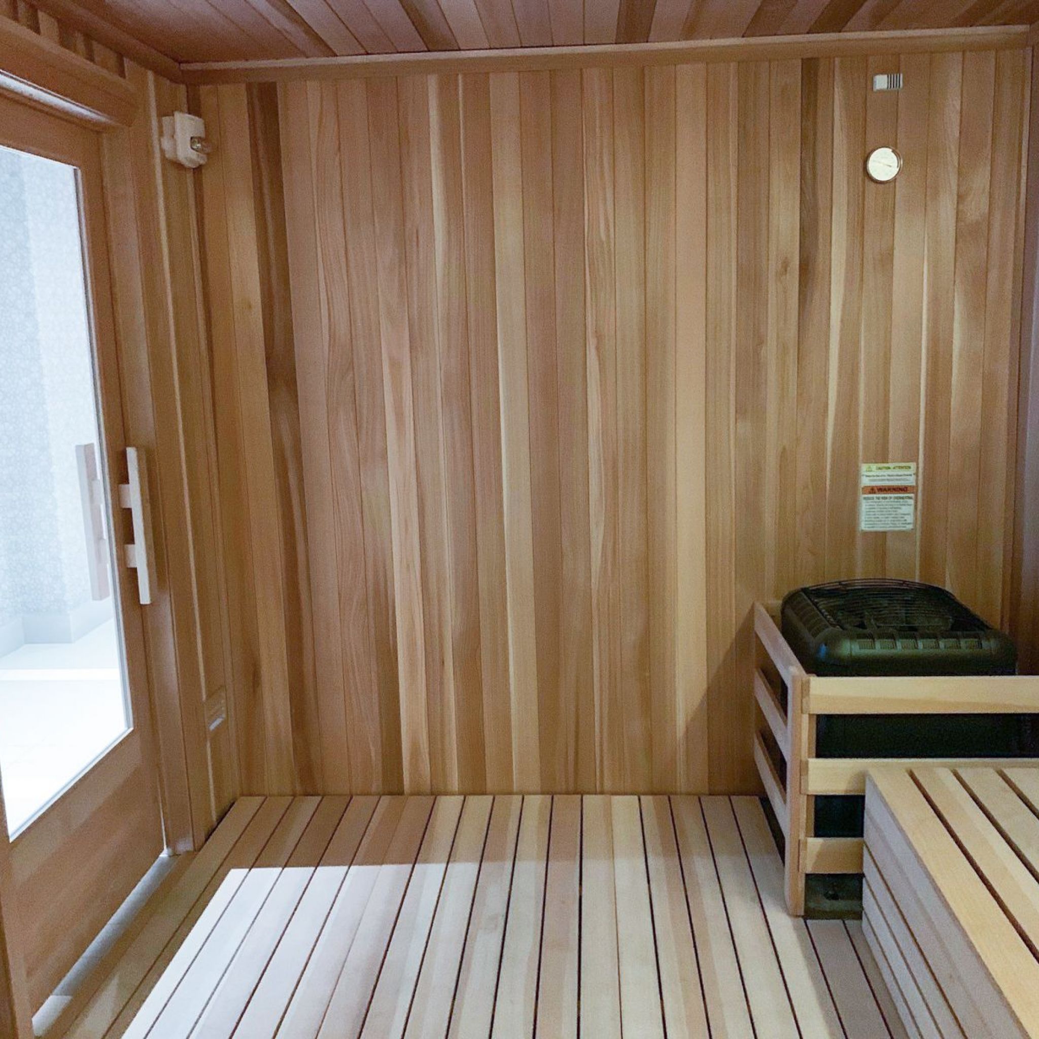 The Vue Charlotte sauna room in spa with wood paneling