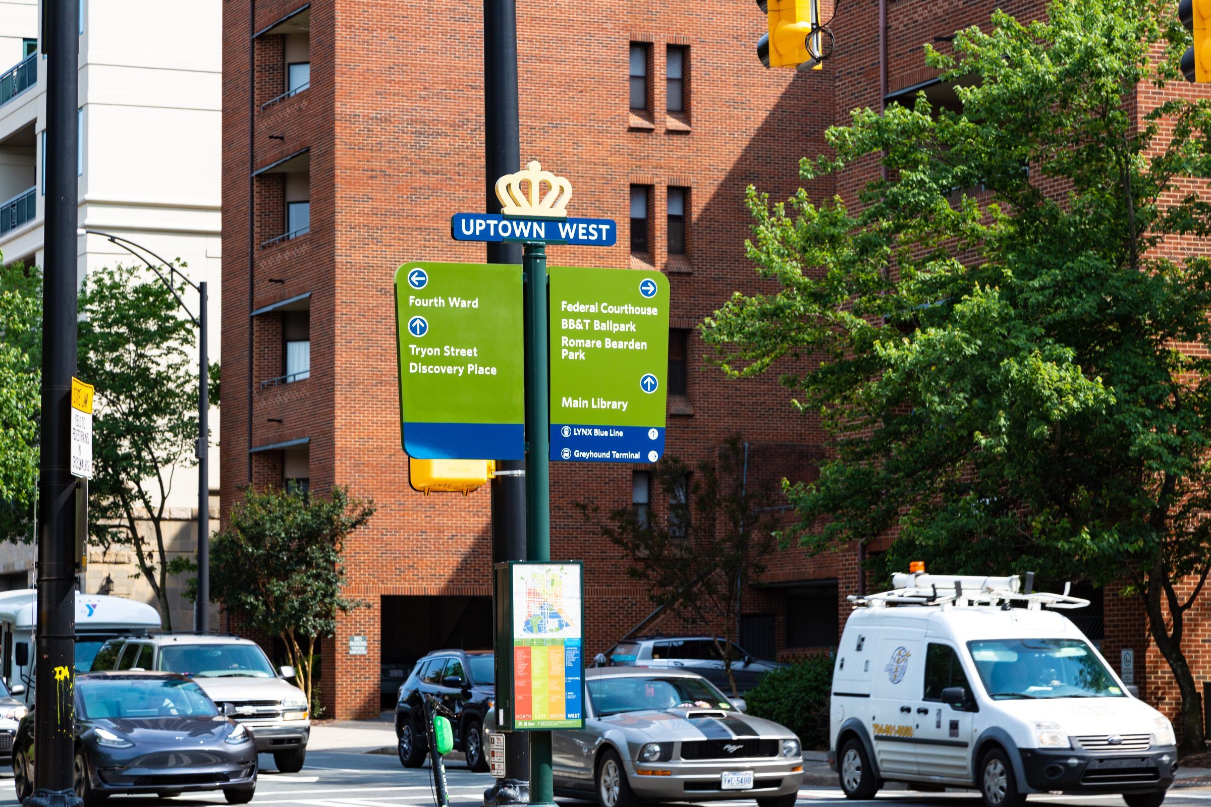 The Vue at Charlotte, NC luxury apartments, centrally located Uptown West traffic sign at the corner of city street