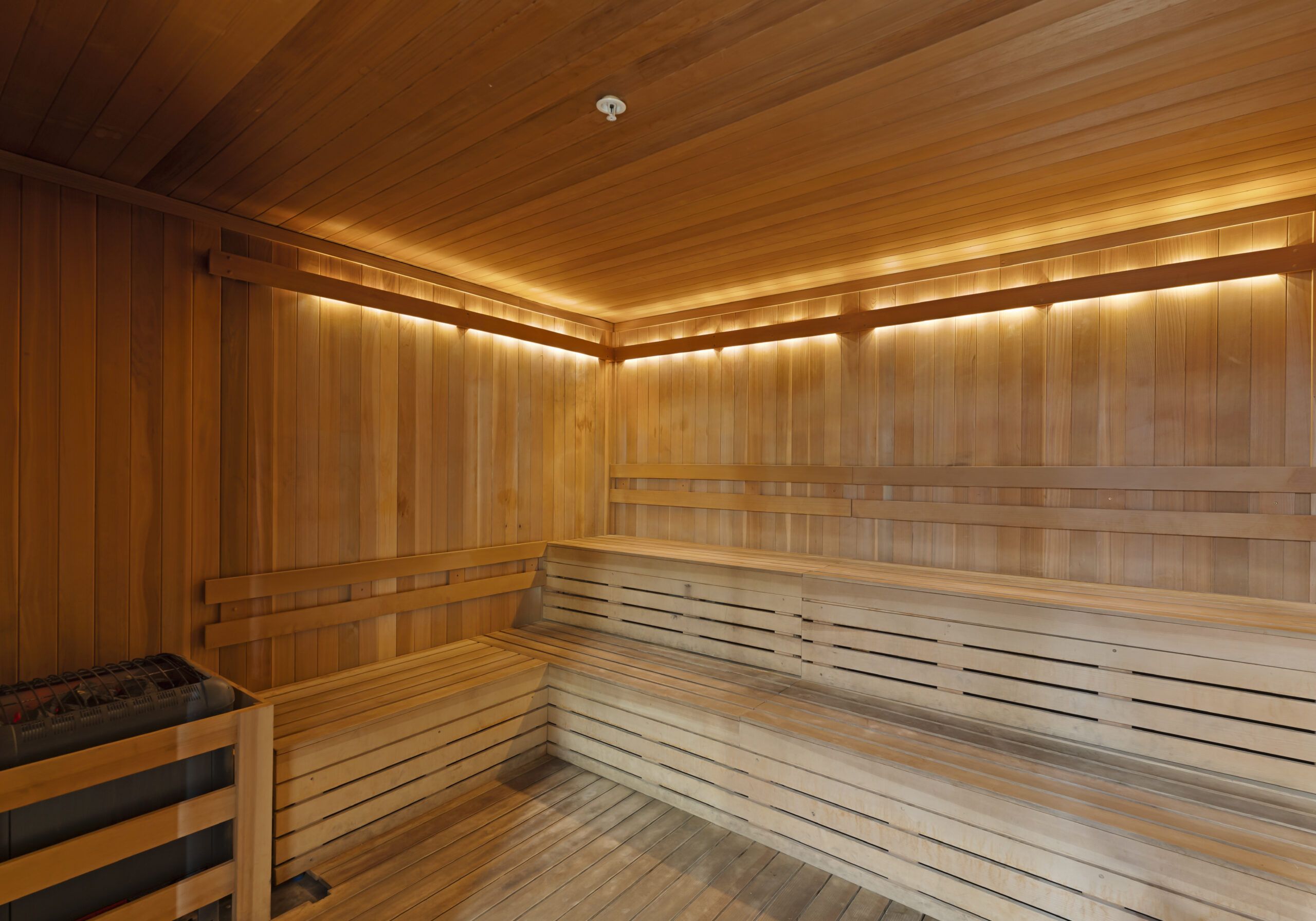 The Vue Charlotte sauna room in spa with wood paneling