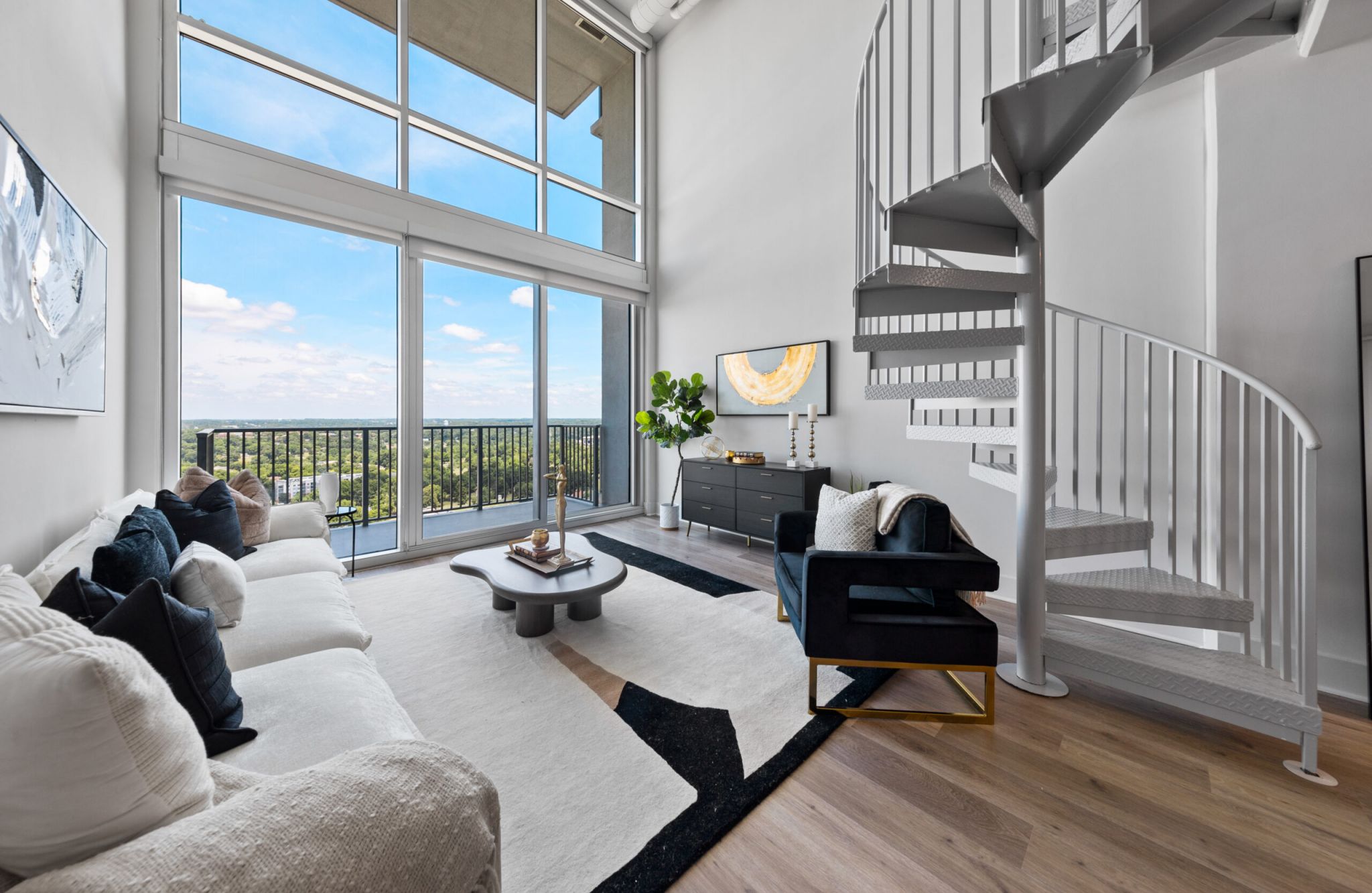 The Vue Charlotte apartment interior kitchen with granite countertops and hardwood floors