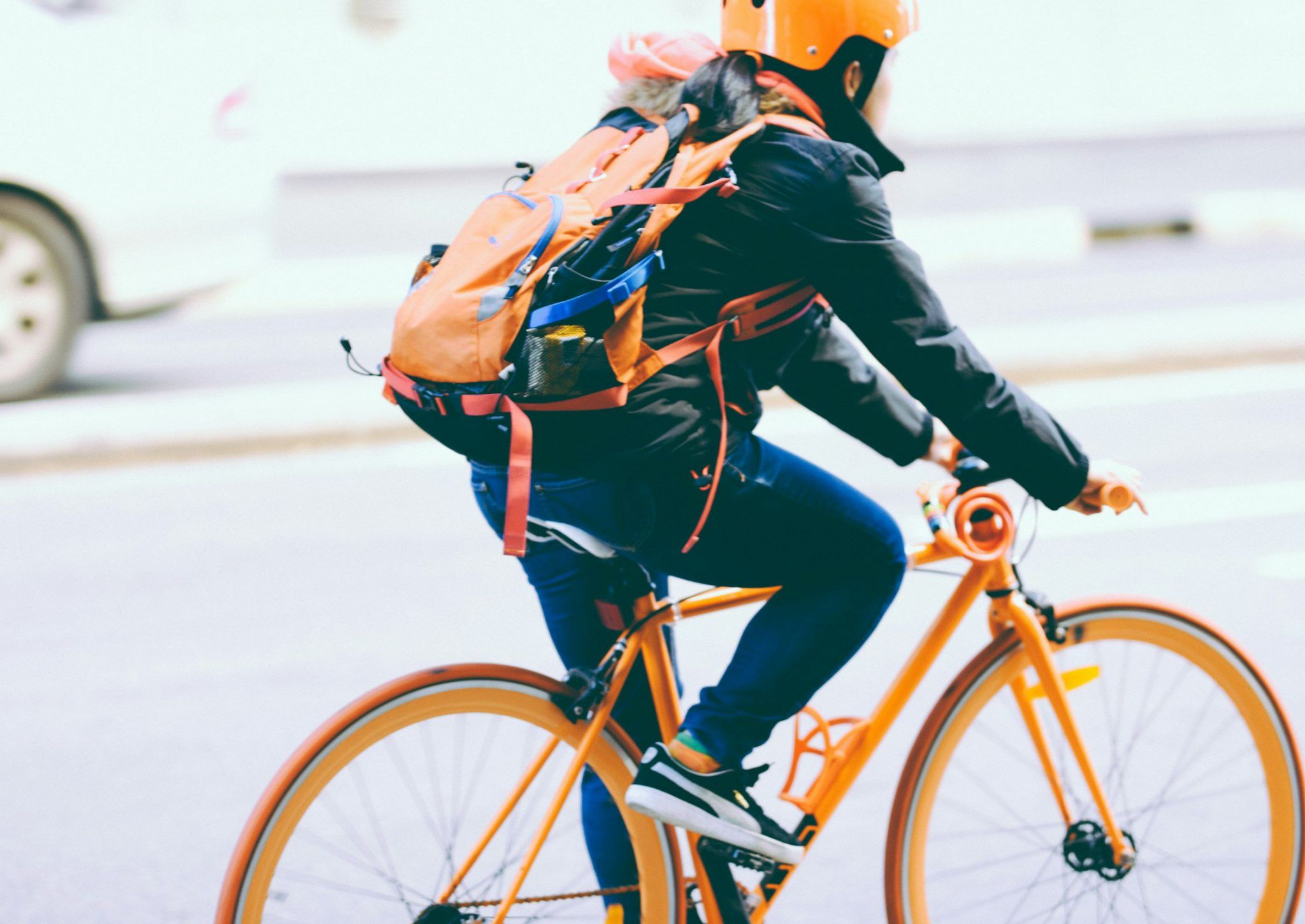 The Vue at Charlotte, NC - bikeriding in the neighborhood on an orange bike with an orange helmet