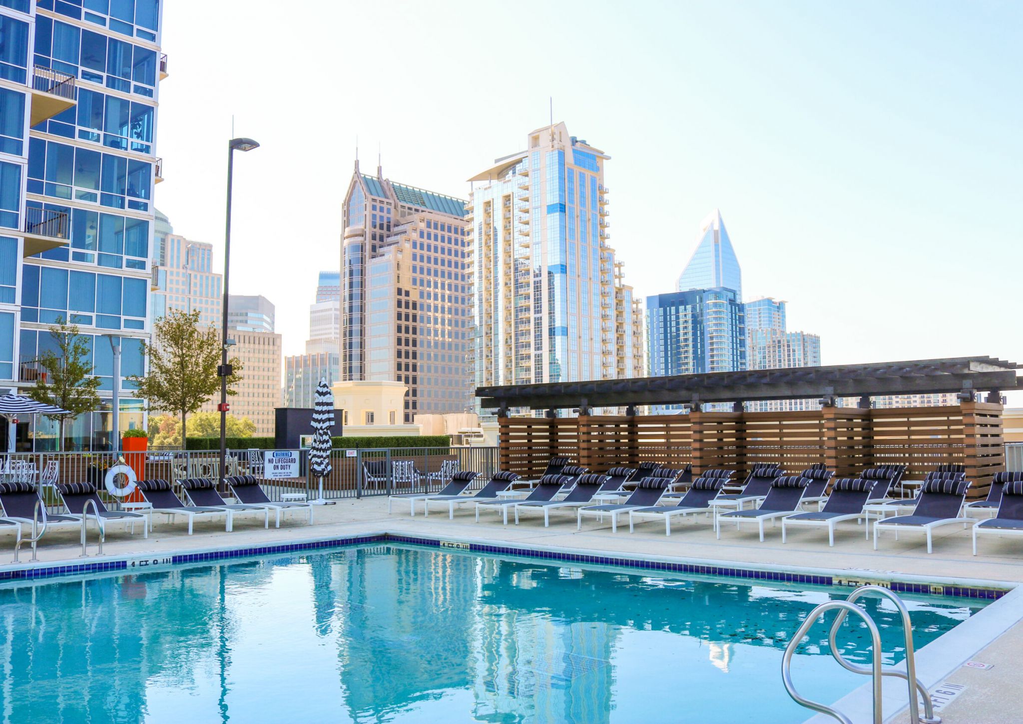 The Vue Charlotte rooftop luxury pool with surrounding outdoor lounge area